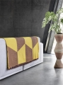 Narzuta SWAY THROW musztardowa Muuto