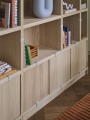 stacked-bookcase-1-oak-relevo-rug-burnt-orange-kink-vase-light-blue-muuto-org.jpg