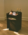 editorial-folded-trolley-62-dark-red-raise-glass-clear-burnt-orange-HI-RES.jpg